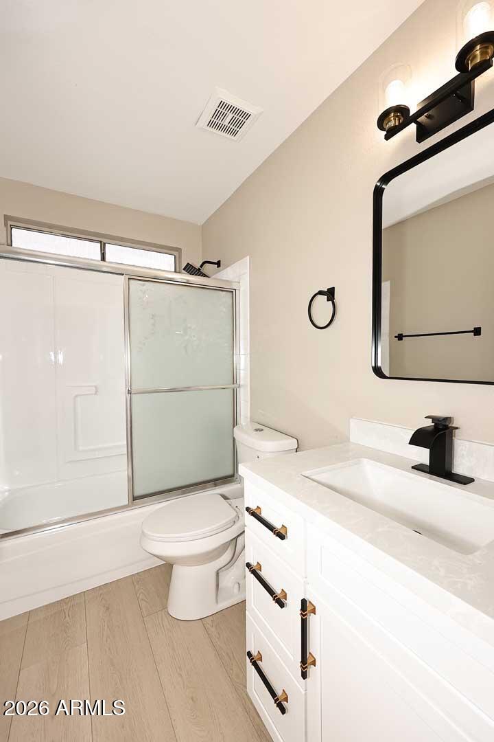 10844 West Ruth Avenue Peoria, AZ 85345 - Photo 21 of 33 a bathroom with a sink a toilet and shower