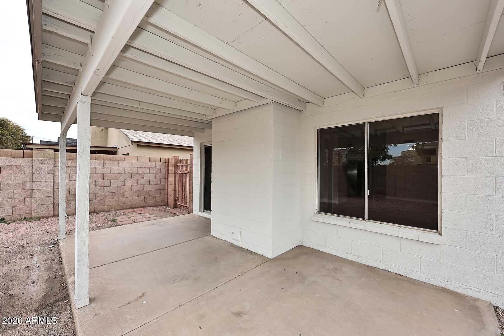 10844 West Ruth Avenue Peoria, AZ 85345 - Photo 29 of 33 a view of a glass door of the house