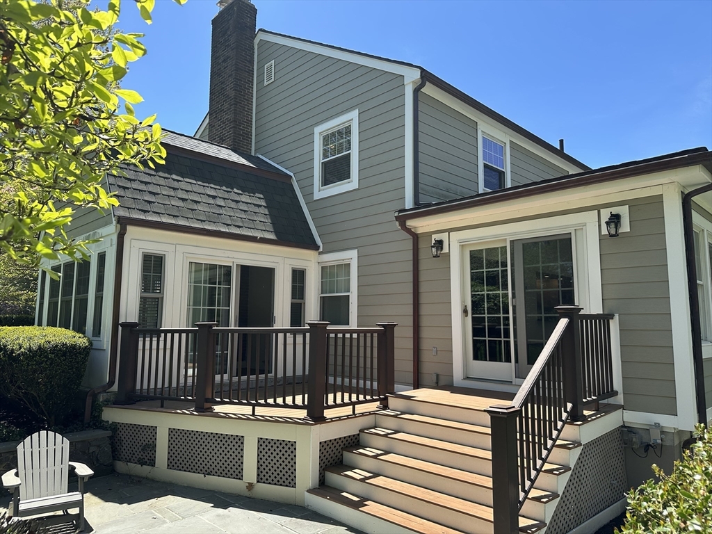 45 Wellesley Road Belmont, MA 02478 - Photo 36 of 42 a front view of a house with a porch