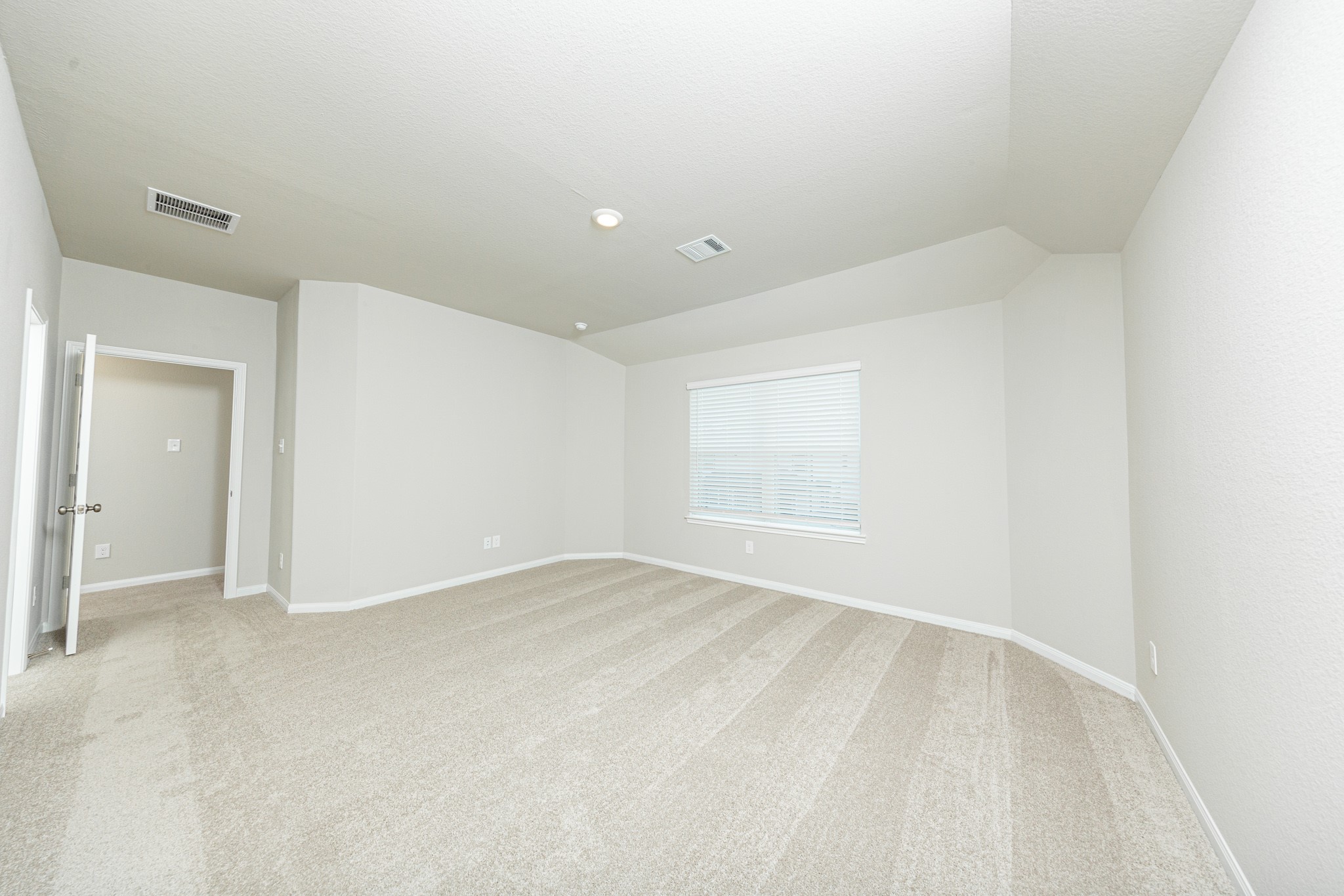 13663 Kit Run Splendora, TX 77372 - Photo 14 of 28 an empty room with a natural light