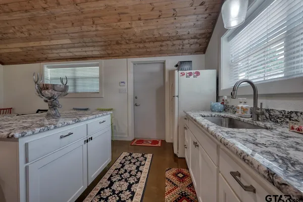 a view of a town with mountains in the background