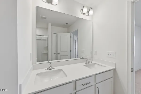 a bathroom with a bathtub and a toilet