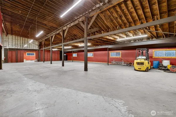 a view of an empty room with storage