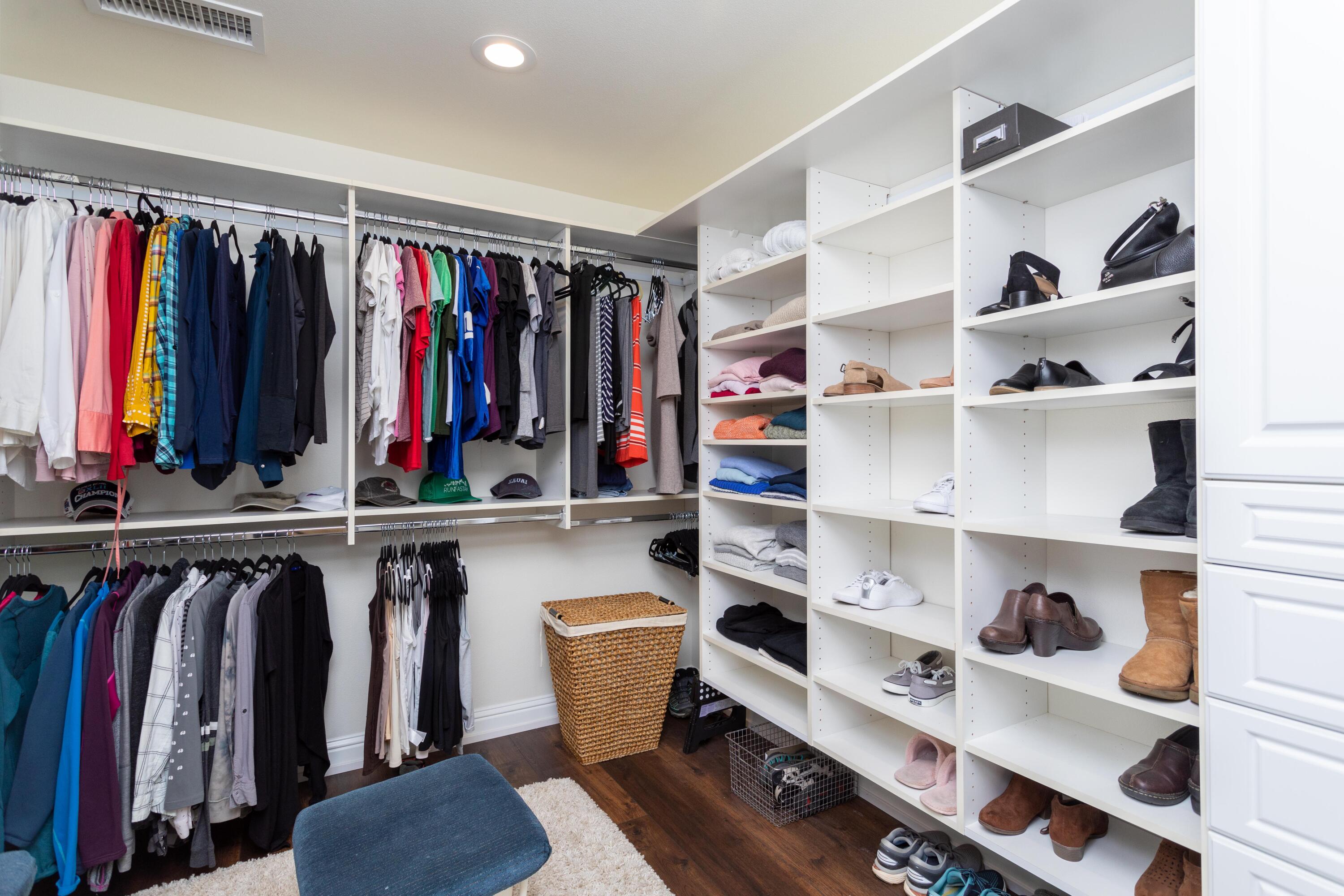 5956 Riverside Drive Redding, CA 96001 - Photo 32 of 54 a view of walk in closet with clothes and shoes