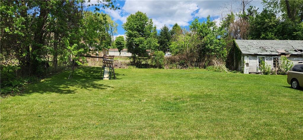2014 5th Street Cardale, PA 15420 - Photo 11 of 11 a garden with trees in front of it