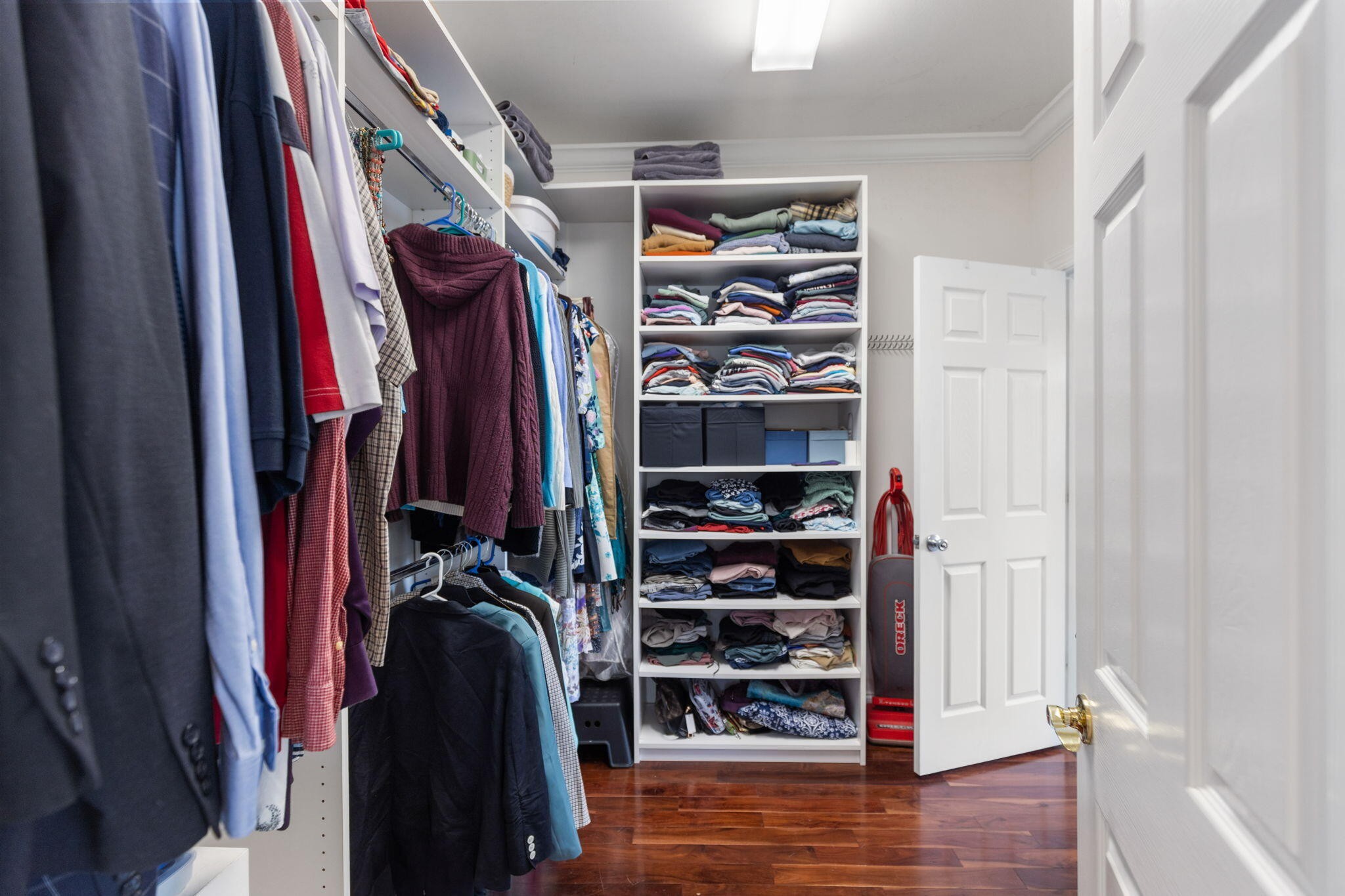 2415 Yellowood Court Cleveland, TN 37312 - Photo 29 of 83 a view of walk in closet with clothes and shoes