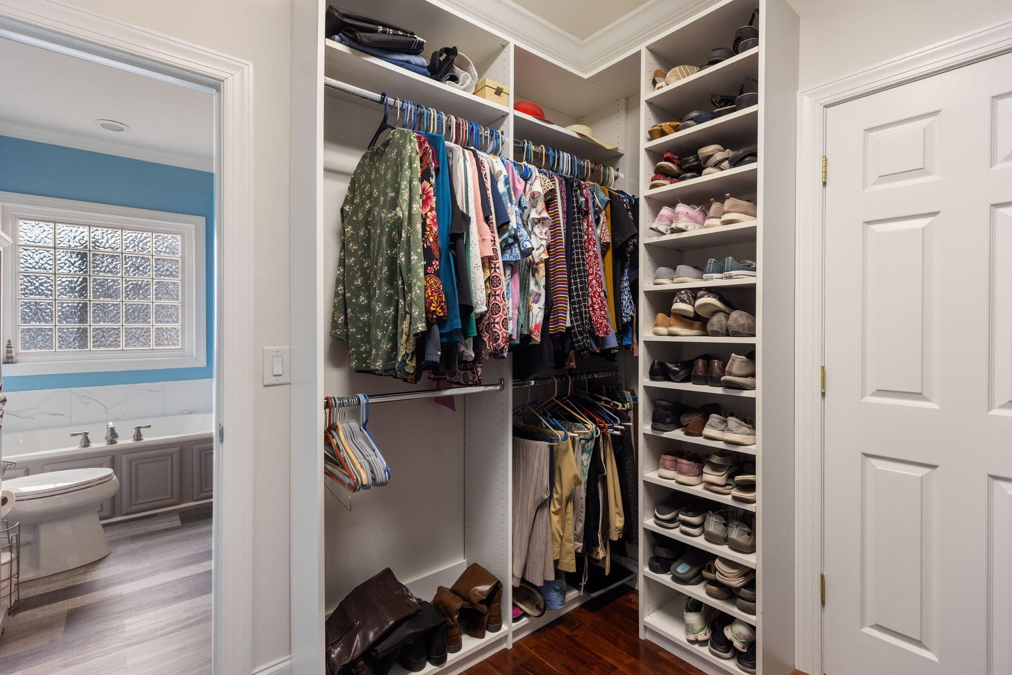 2415 Yellowood Court Cleveland, TN 37312 - Photo 30 of 83 a view of walk in closet with clothes and shoes