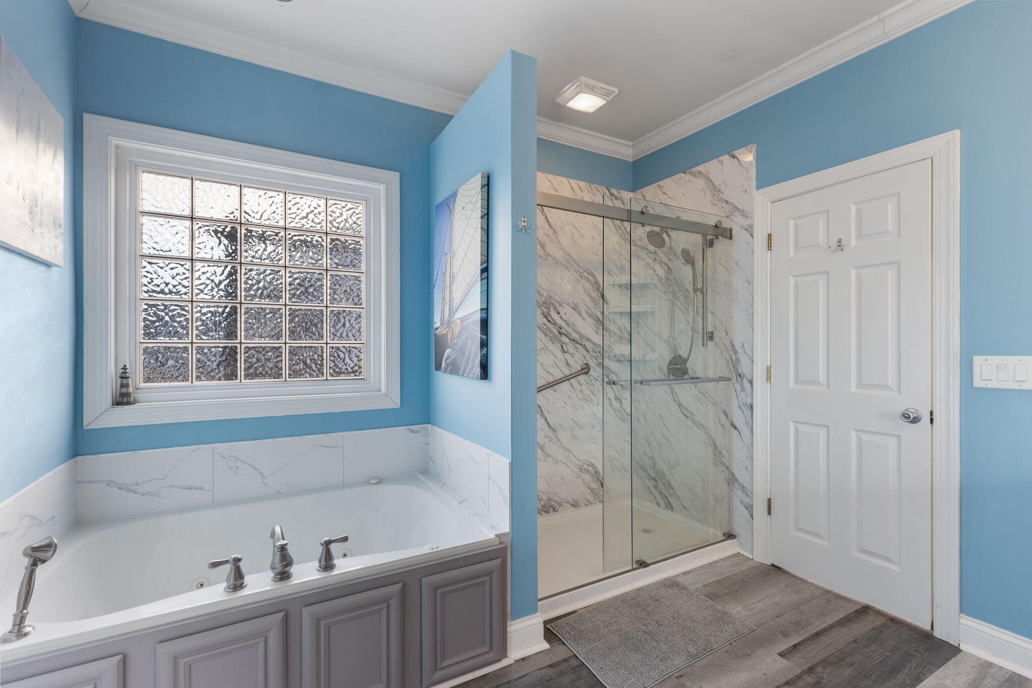 2415 Yellowood Court Cleveland, TN 37312 - Photo 33 of 83 a bathroom with a bathtub and a shower
