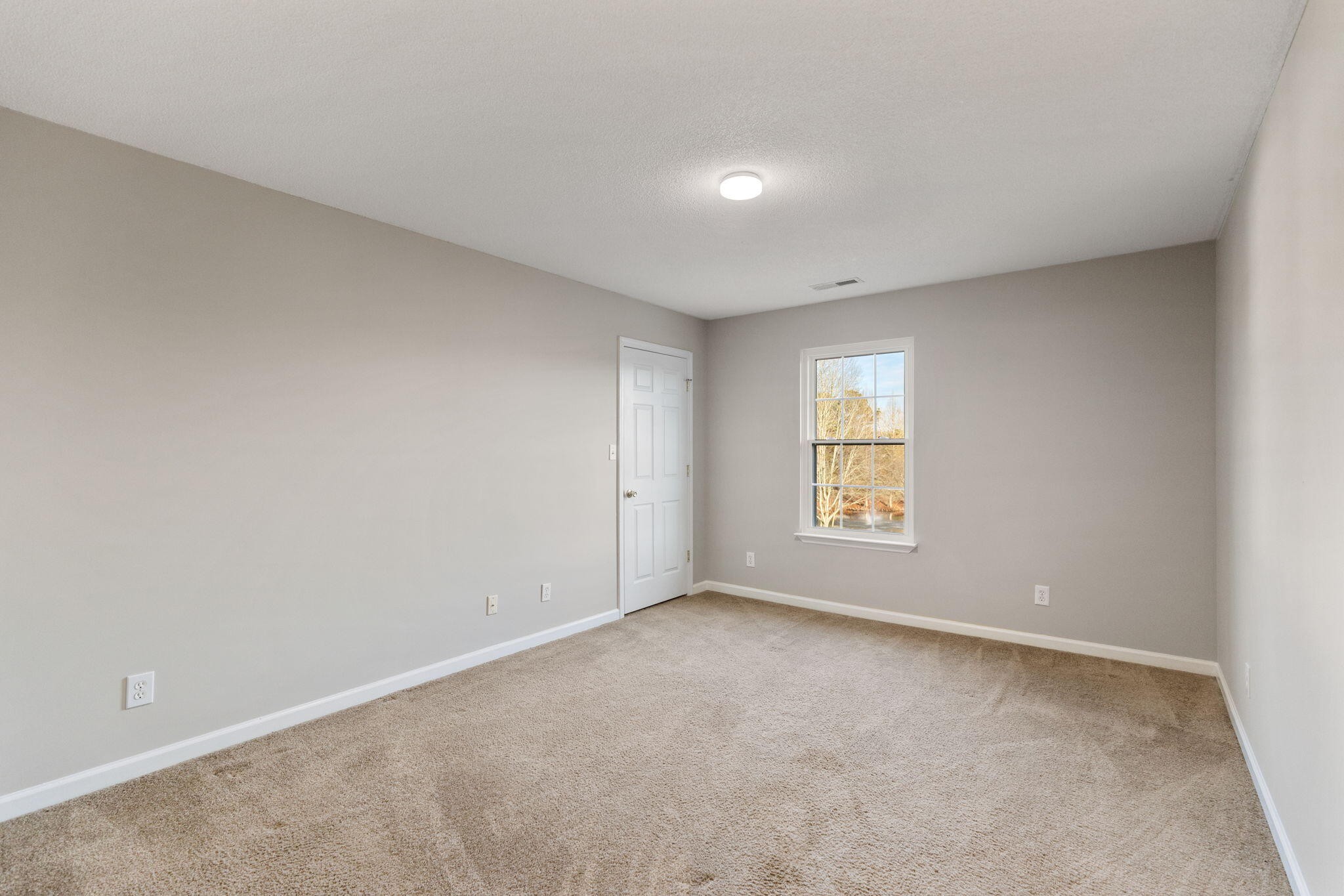 2415 Yellowood Court Cleveland, TN 37312 - Photo 44 of 83 a view of an empty room with a window