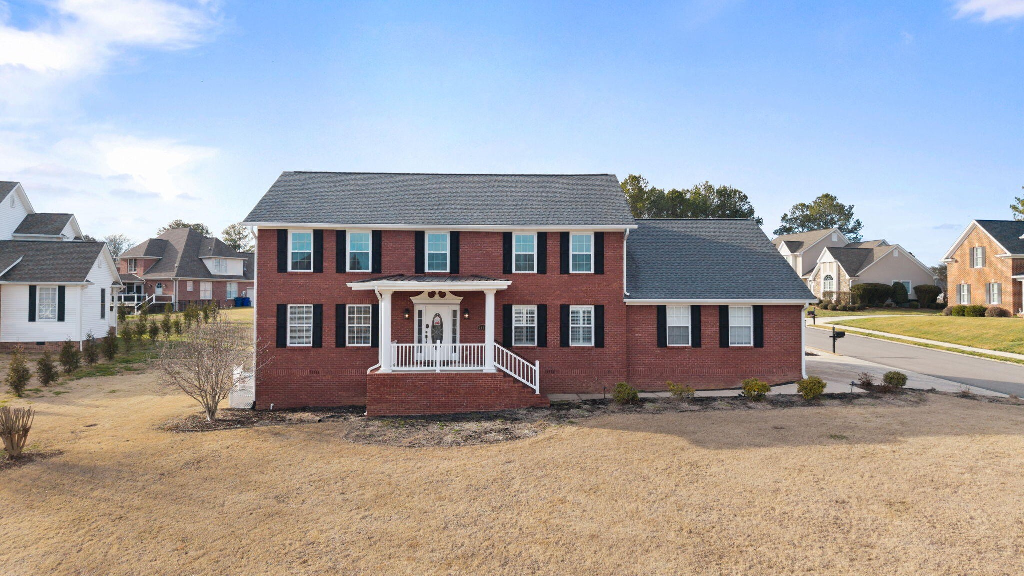 2415 Yellowood Court Cleveland, TN 37312 - Photo 83 of 83 front view of a house with a yard