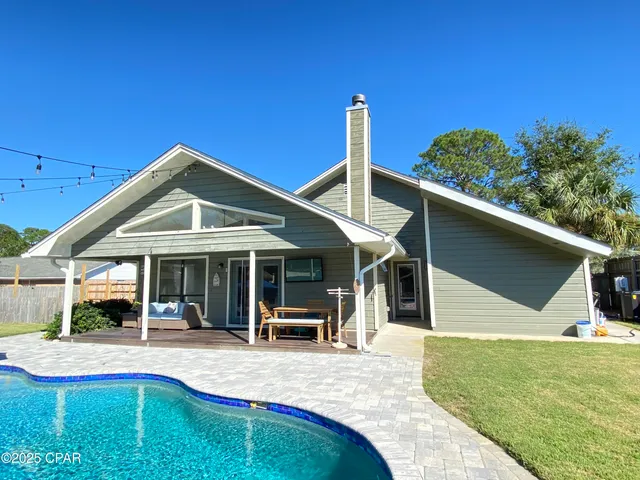 $699,900 | 215 Moonlight Bay Drive, Panama City Beach, FL 32407