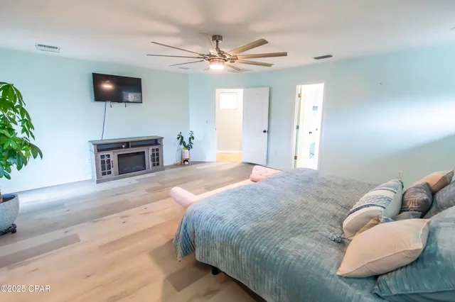 $699,900 | 215 Moonlight Bay Drive, Panama City Beach, FL 32407