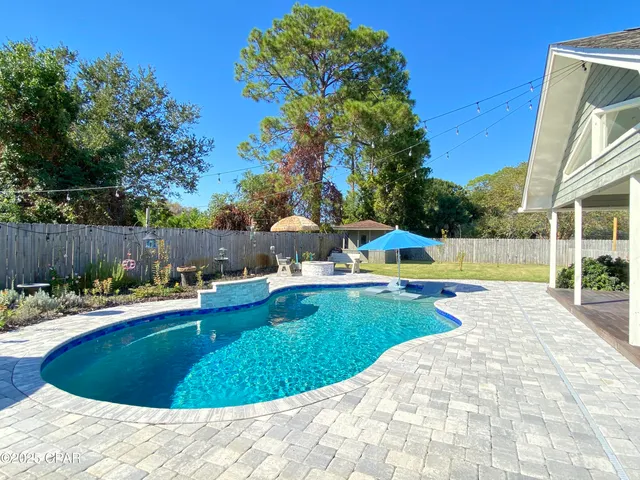 $699,900 | 215 Moonlight Bay Drive, Panama City Beach, FL 32407