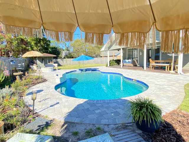 $699,900 | 215 Moonlight Bay Drive, Panama City Beach, FL 32407