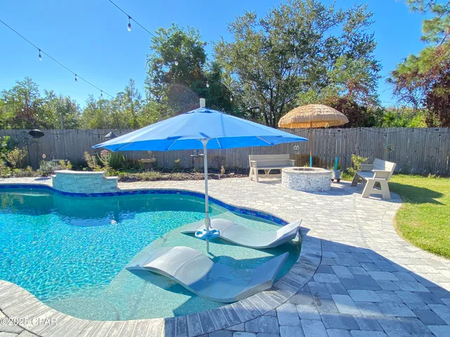 $699,900 | 215 Moonlight Bay Drive, Panama City Beach, FL 32407