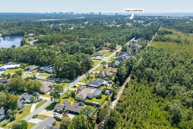 $699,900 | 215 Moonlight Bay Drive, Panama City Beach, FL 32407