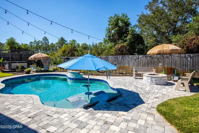 $699,900 | 215 Moonlight Bay Drive, Panama City Beach, FL 32407