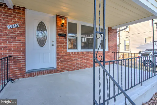 a view of a two door of the house