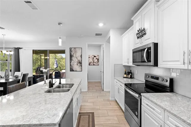 $427,500 | 3903 Winged Elm Court, Clermont, FL 34714