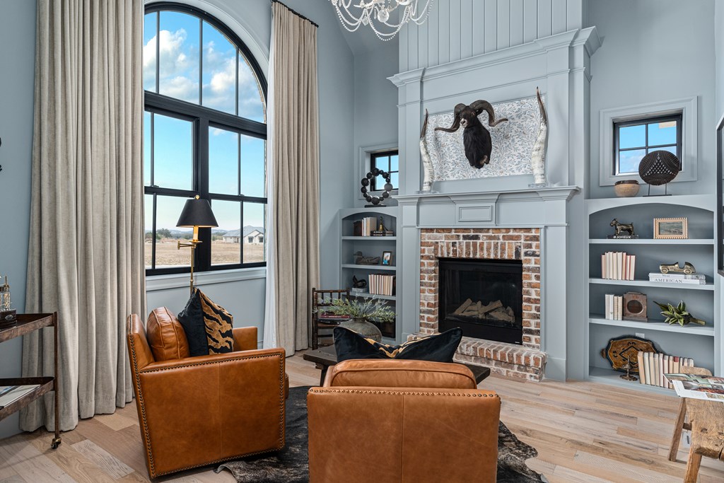 4412 Comanche Trace Drive Kerrville, TX 78028 - Photo 23 of 46 a living room with furniture and a fireplace