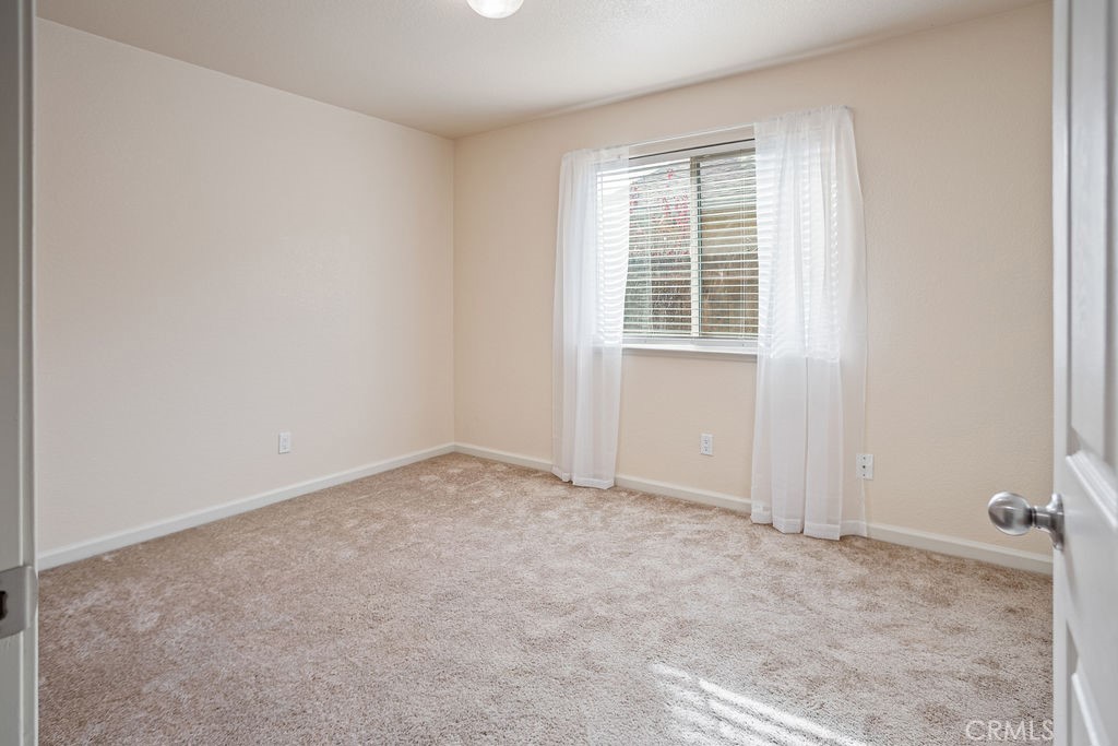 2344 Siena Court Merced, CA 95341 - Photo 12 of 19 an empty room with a window