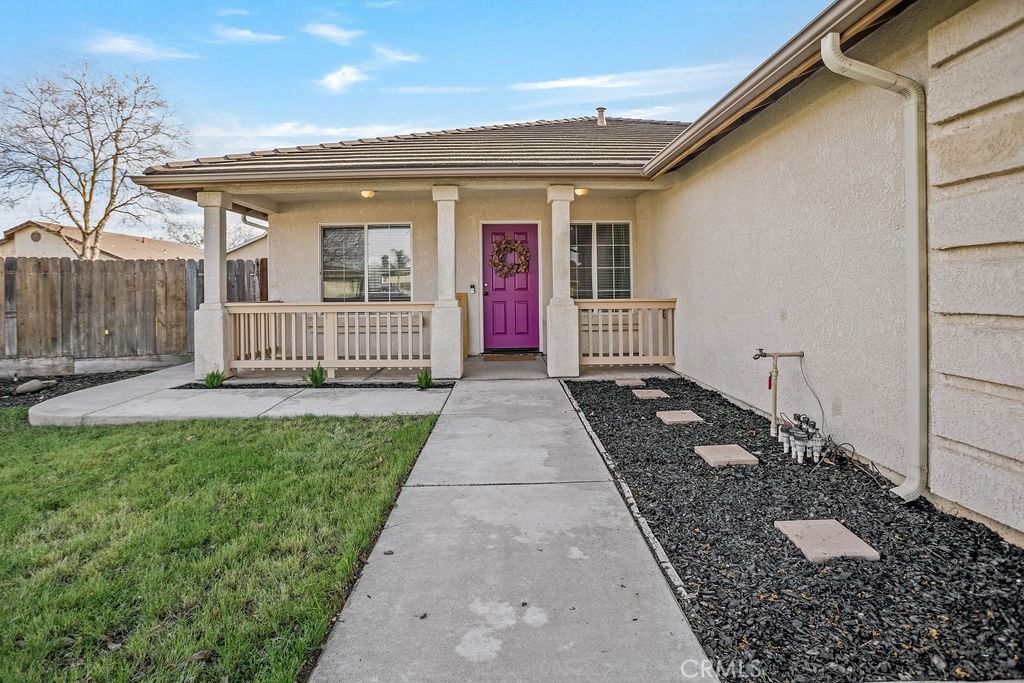 2344 Siena Court Merced, CA 95341 - Photo 3 of 19 a front view of a house with a garden
