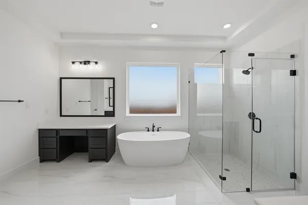 a bathroom with a double vanity sink mirror and