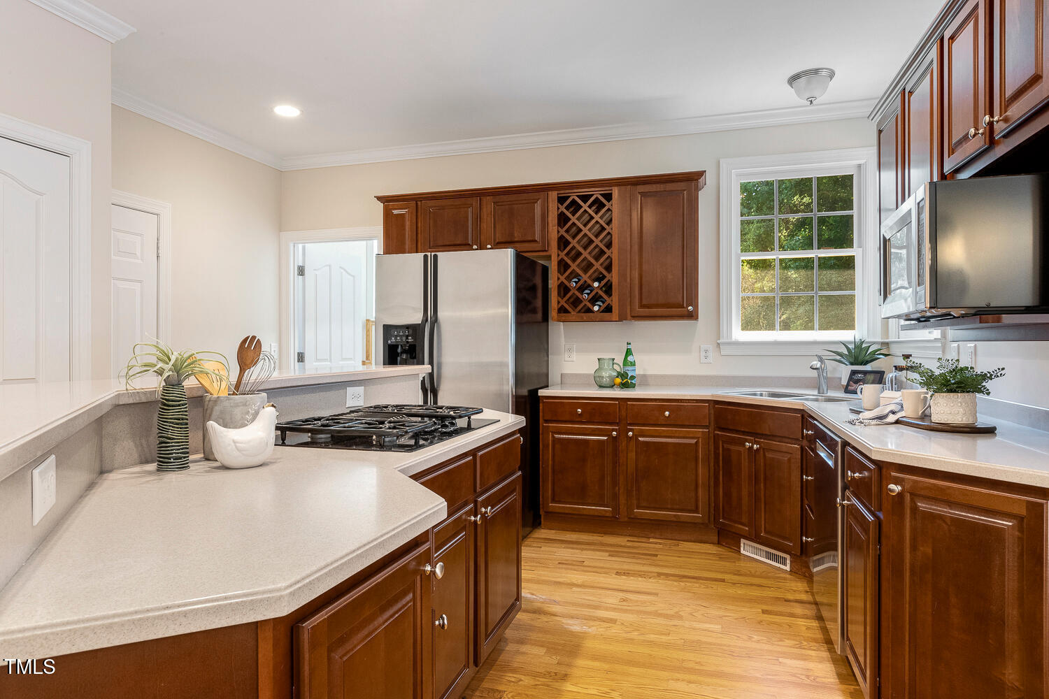 2628 Hunters Meadow Lane Raleigh, NC 27606 - Photo 14 of 76 a kitchen with stainless steel appliances granite countertop a sink stove and refrigerator