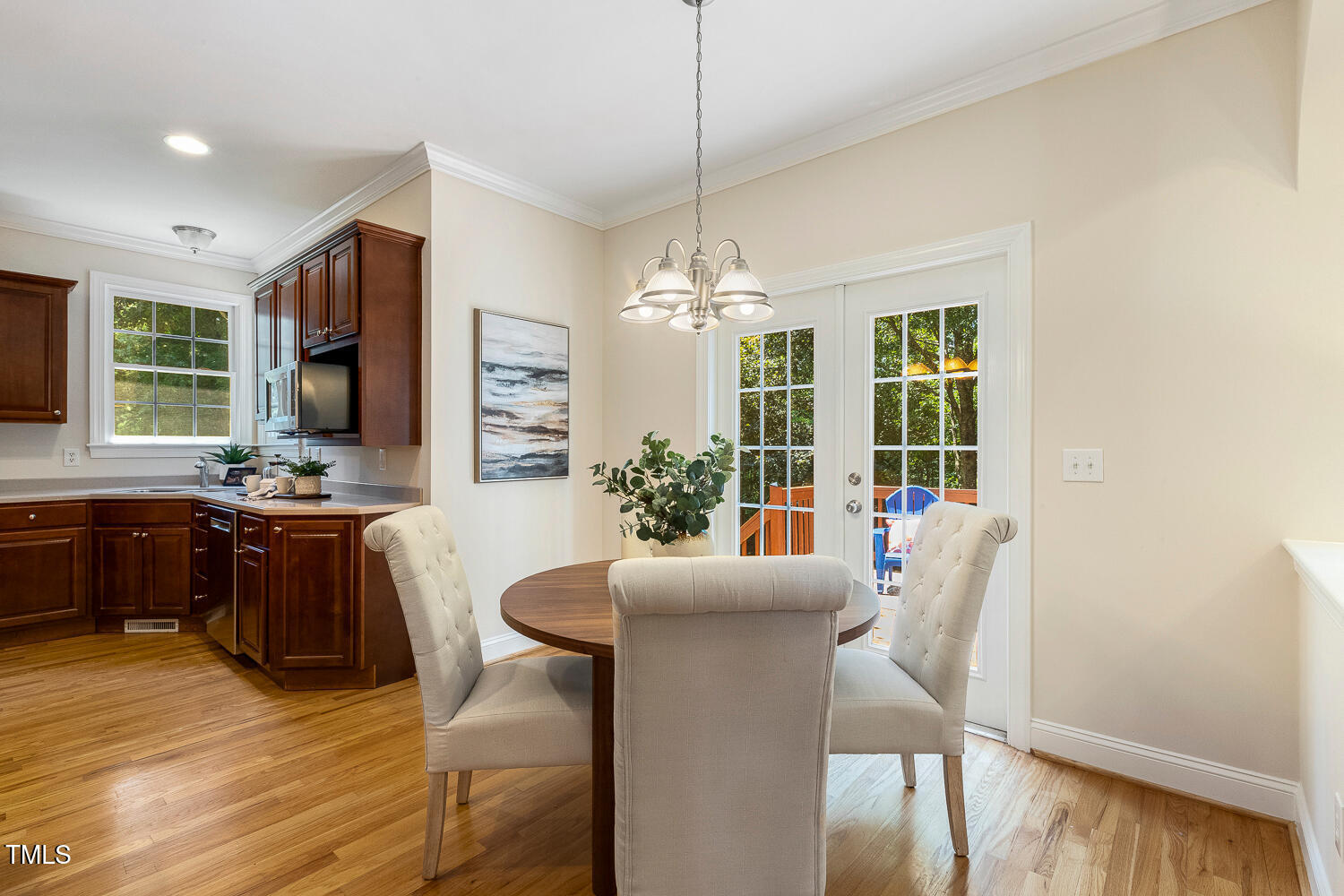 2628 Hunters Meadow Lane Raleigh, NC 27606 - Photo 20 of 76 a view of a dining room with furniture window and outside view