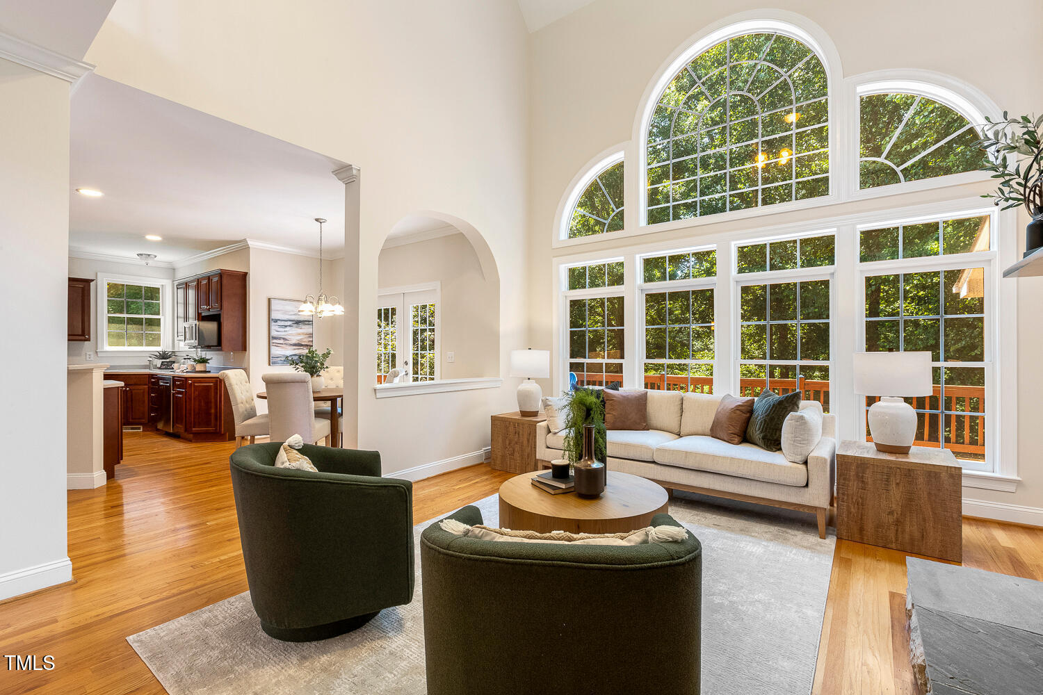 2628 Hunters Meadow Lane Raleigh, NC 27606 - Photo 25 of 76 a living room with fireplace furniture and a large window