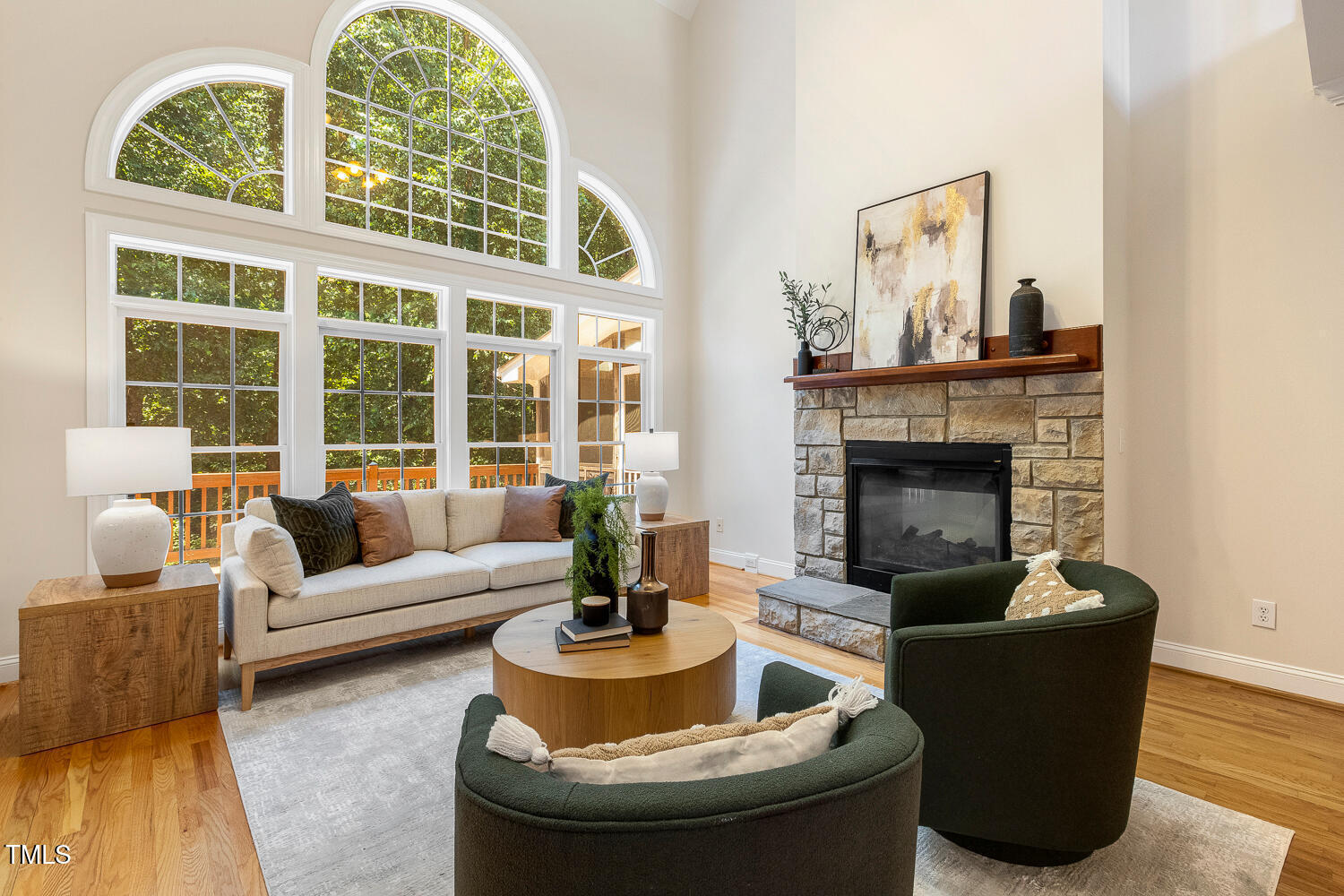 2628 Hunters Meadow Lane Raleigh, NC 27606 - Photo 26 of 76 a living room with furniture and a fireplace