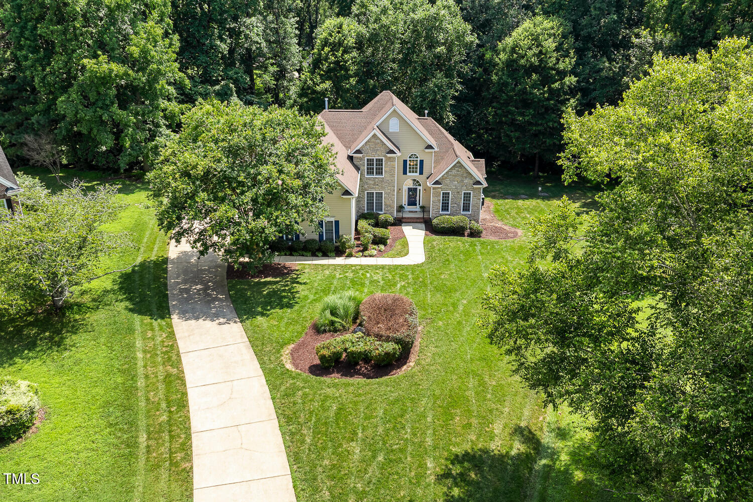 2628 Hunters Meadow Lane Raleigh, NC 27606 - Photo 3 of 76 a aerial view of a house with swimming pool and garden