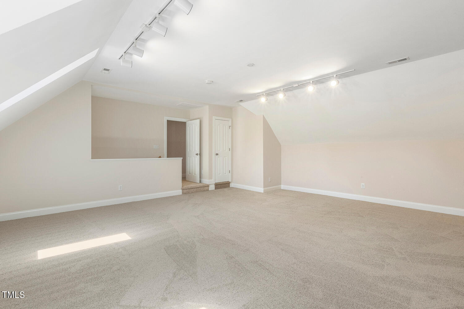 2628 Hunters Meadow Lane Raleigh, NC 27606 - Photo 53 of 76 a view of an empty room