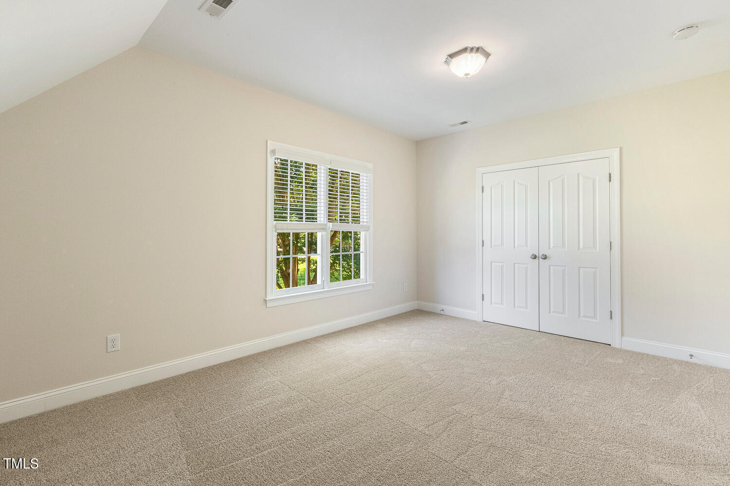 2628 Hunters Meadow Lane Raleigh, NC 27606 - Photo 54 of 76 an empty room with windows