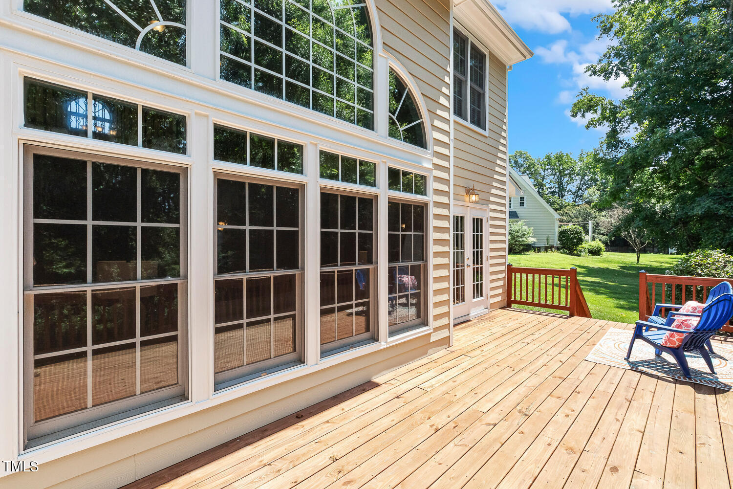 2628 Hunters Meadow Lane Raleigh, NC 27606 - Photo 58 of 76 a view of a deck with table and chairs and wooden floor