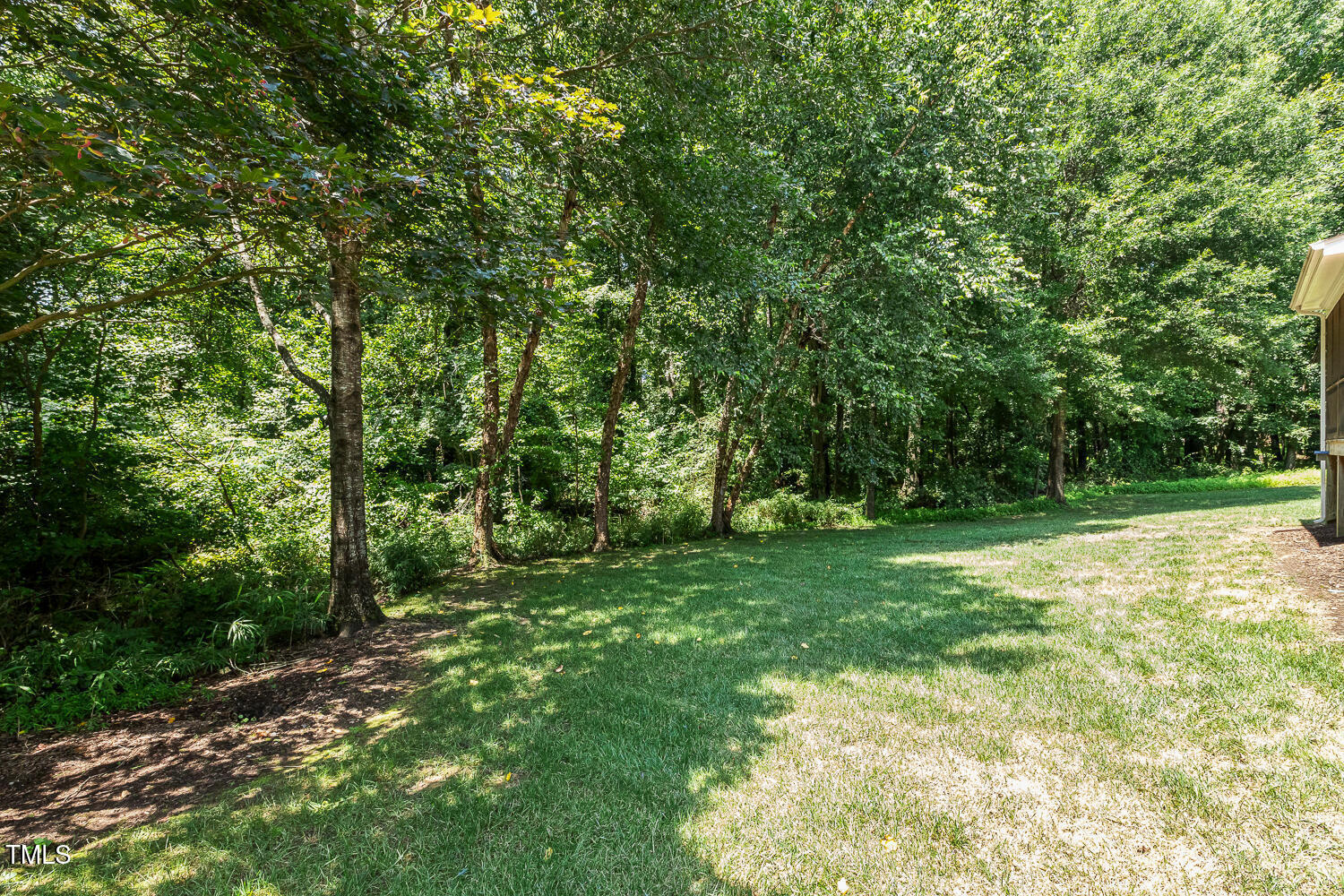 2628 Hunters Meadow Lane Raleigh, NC 27606 - Photo 62 of 76 a view of a yard with a tree