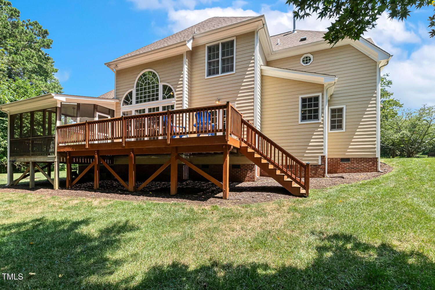 2628 Hunters Meadow Lane Raleigh, NC 27606 - Photo 66 of 76 a view of a house with a yard and deck