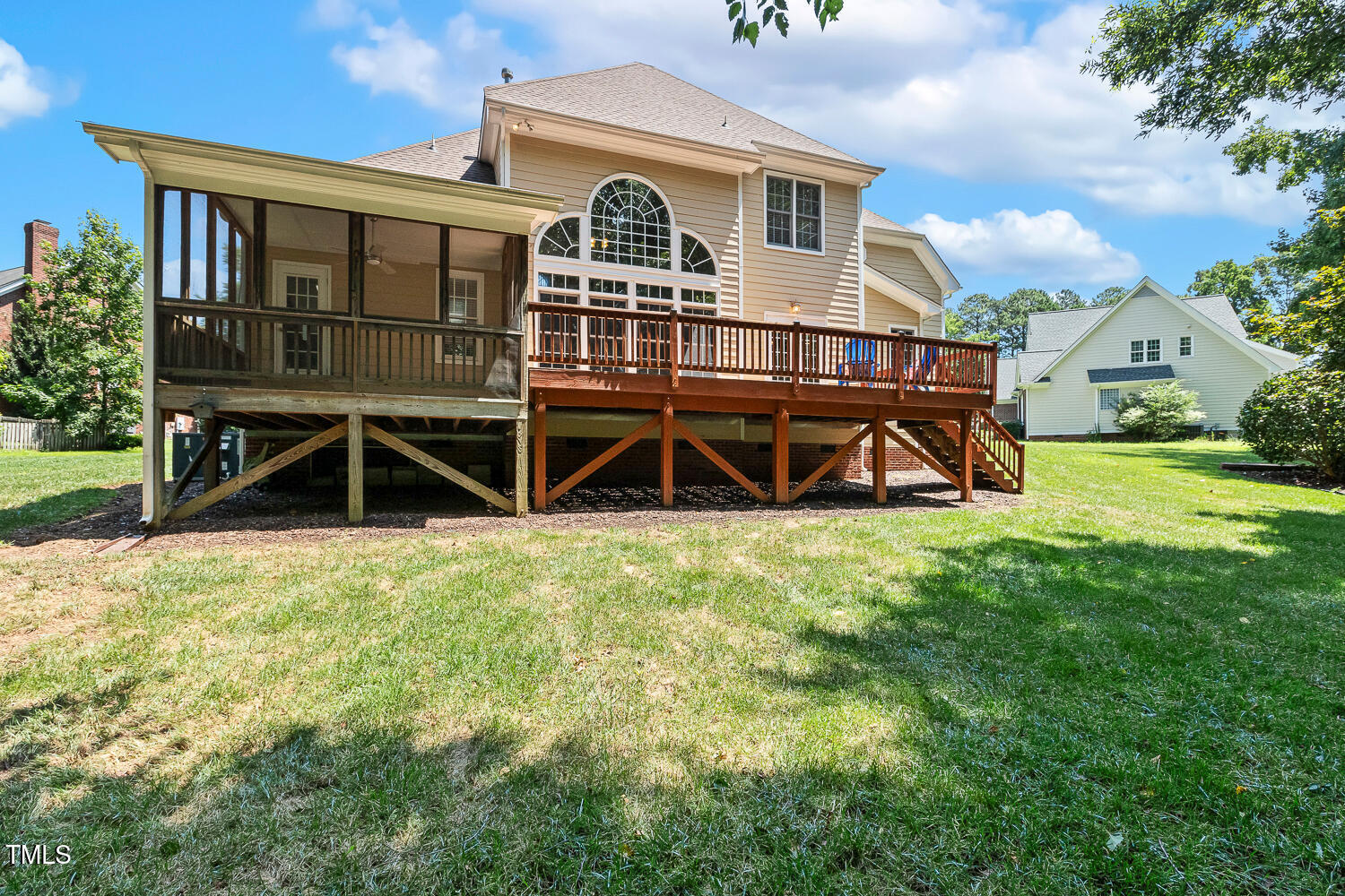 2628 Hunters Meadow Lane Raleigh, NC 27606 - Photo 68 of 76 a view of a house with a backyard