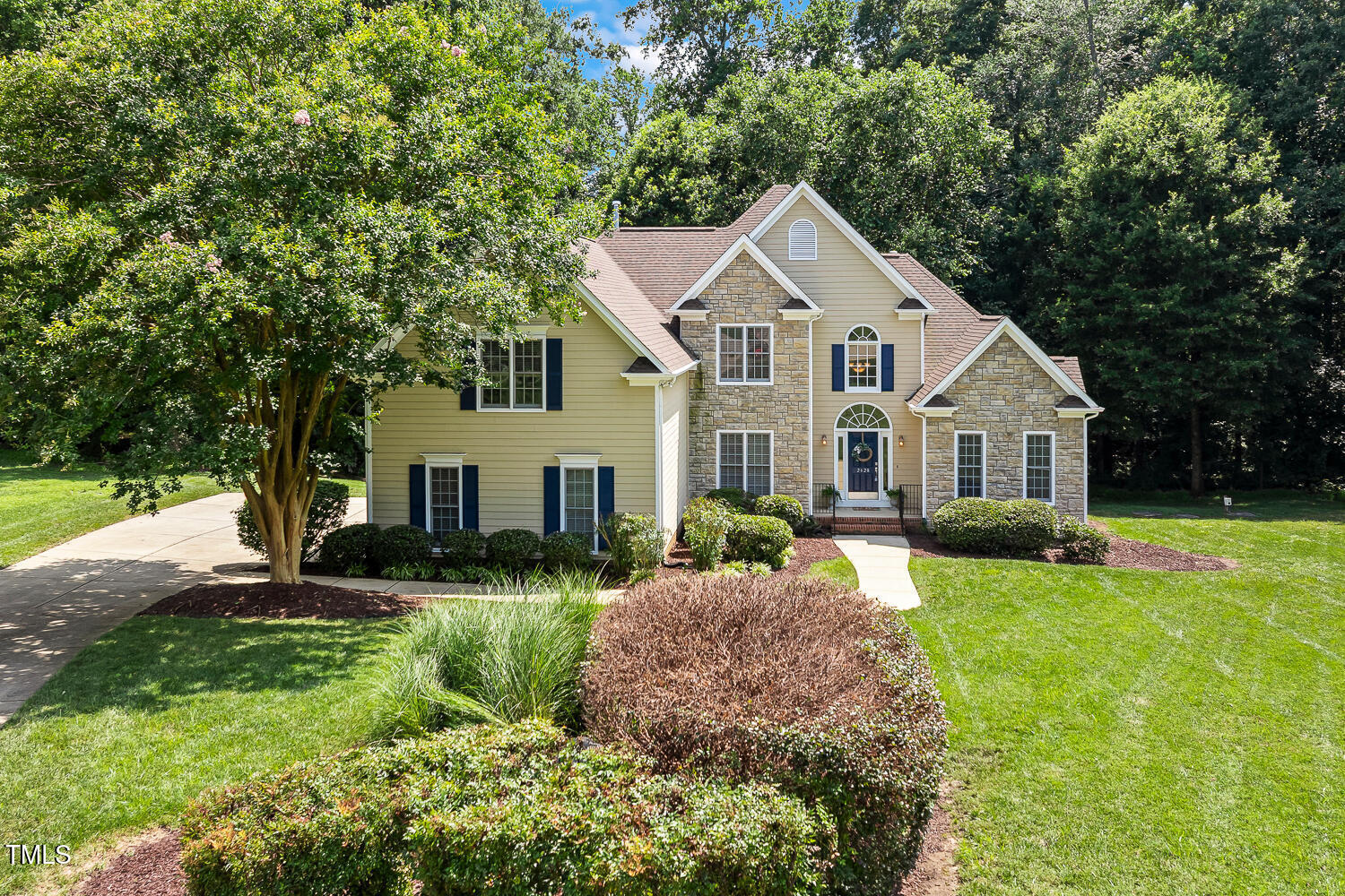 2628 Hunters Meadow Lane Raleigh, NC 27606 - Photo 69 of 76 a front view of house with yard and green space