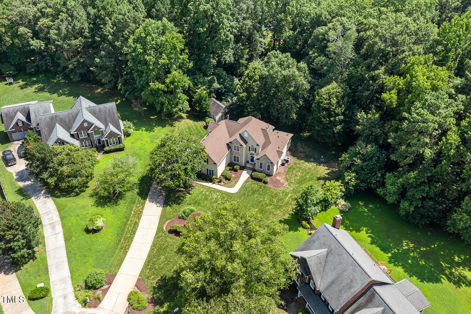 2628 Hunters Meadow Lane Raleigh, NC 27606 - Photo 70 of 76 an aerial view of a house with a yard