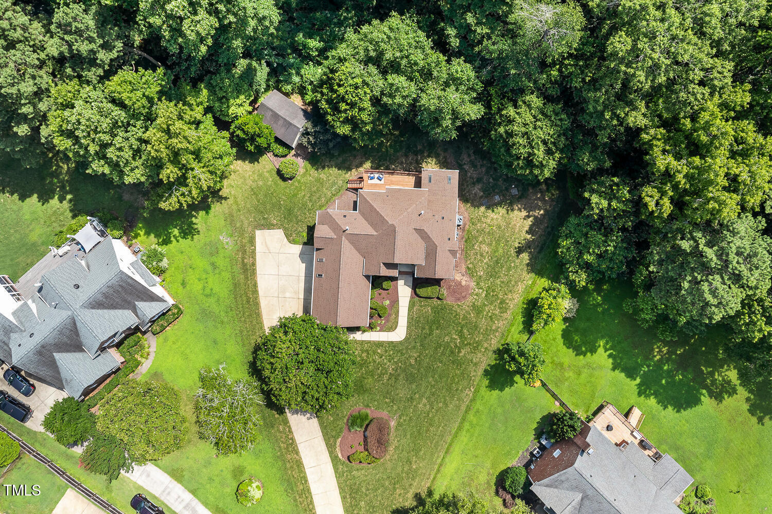 2628 Hunters Meadow Lane Raleigh, NC 27606 - Photo 72 of 76 an aerial view of a house with a yard basket ball court and outdoor seating