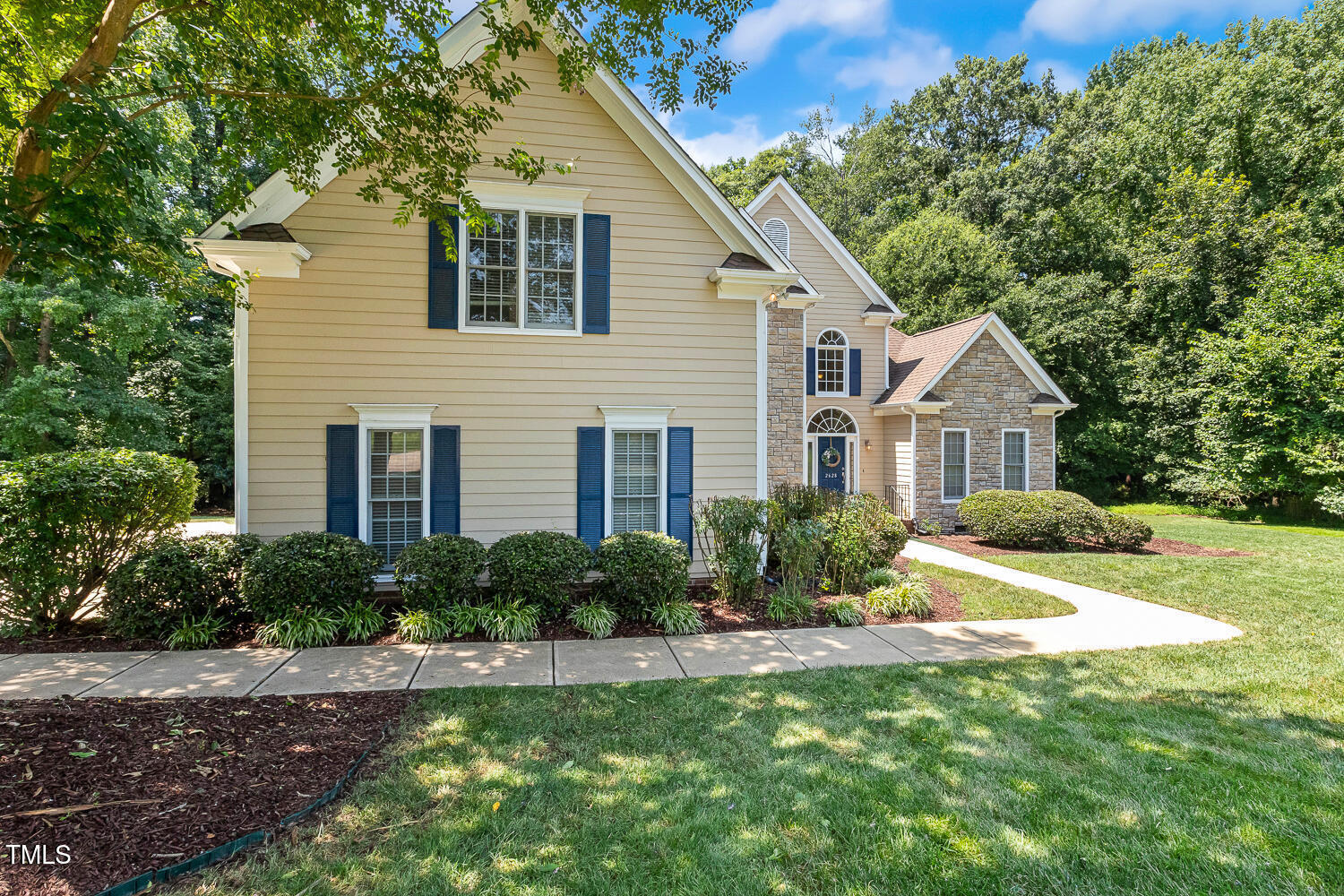 2628 Hunters Meadow Lane Raleigh, NC 27606 - Photo 75 of 76 a front view of house with yard and green space