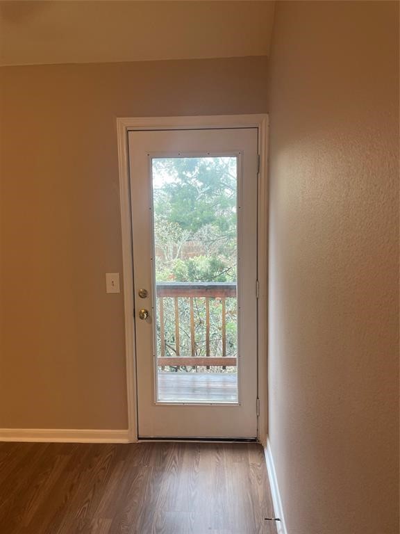 3201 C El Salido Parkway, Unit 221 Cedar Park, TX 78613 - Photo 16 of 18 a view of an empty room with wooden floor and a window