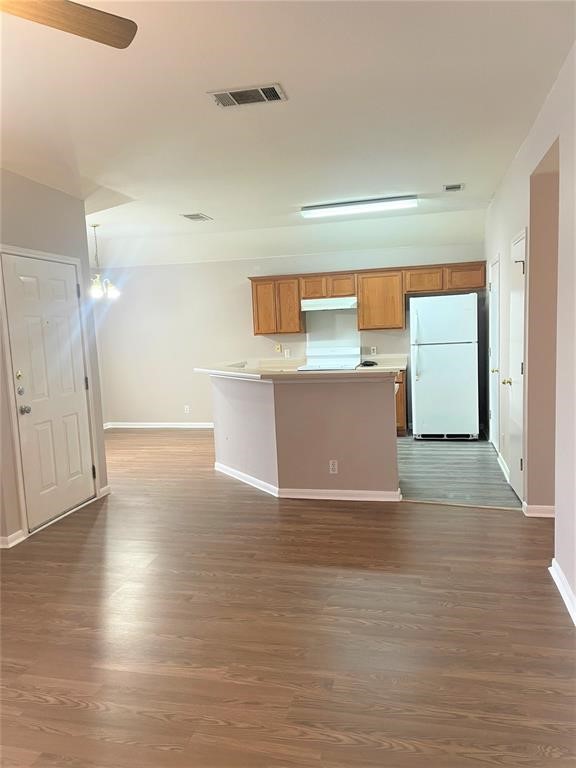 3201 C El Salido Parkway, Unit 221 Cedar Park, TX 78613 - Photo 2 of 18 a view of a hallway with wooden floor