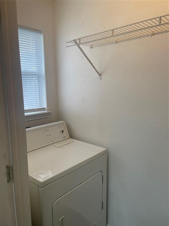 3201 C El Salido Parkway, Unit 221 Cedar Park, TX 78613 - Photo 10 of 18 a utility room with dryer and washer