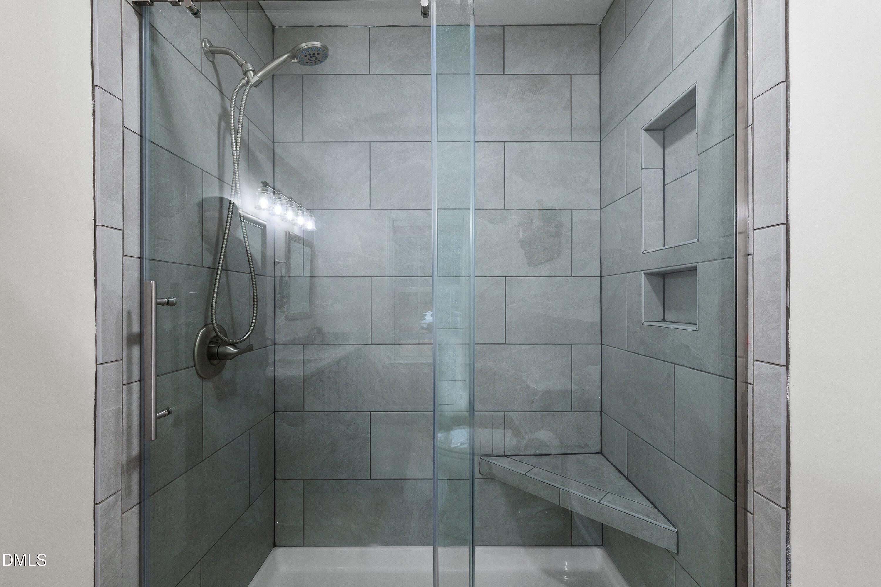 234 Linville Lane Willow Spring, NC 27592 - Photo 18 of 34 a bathroom with a shower