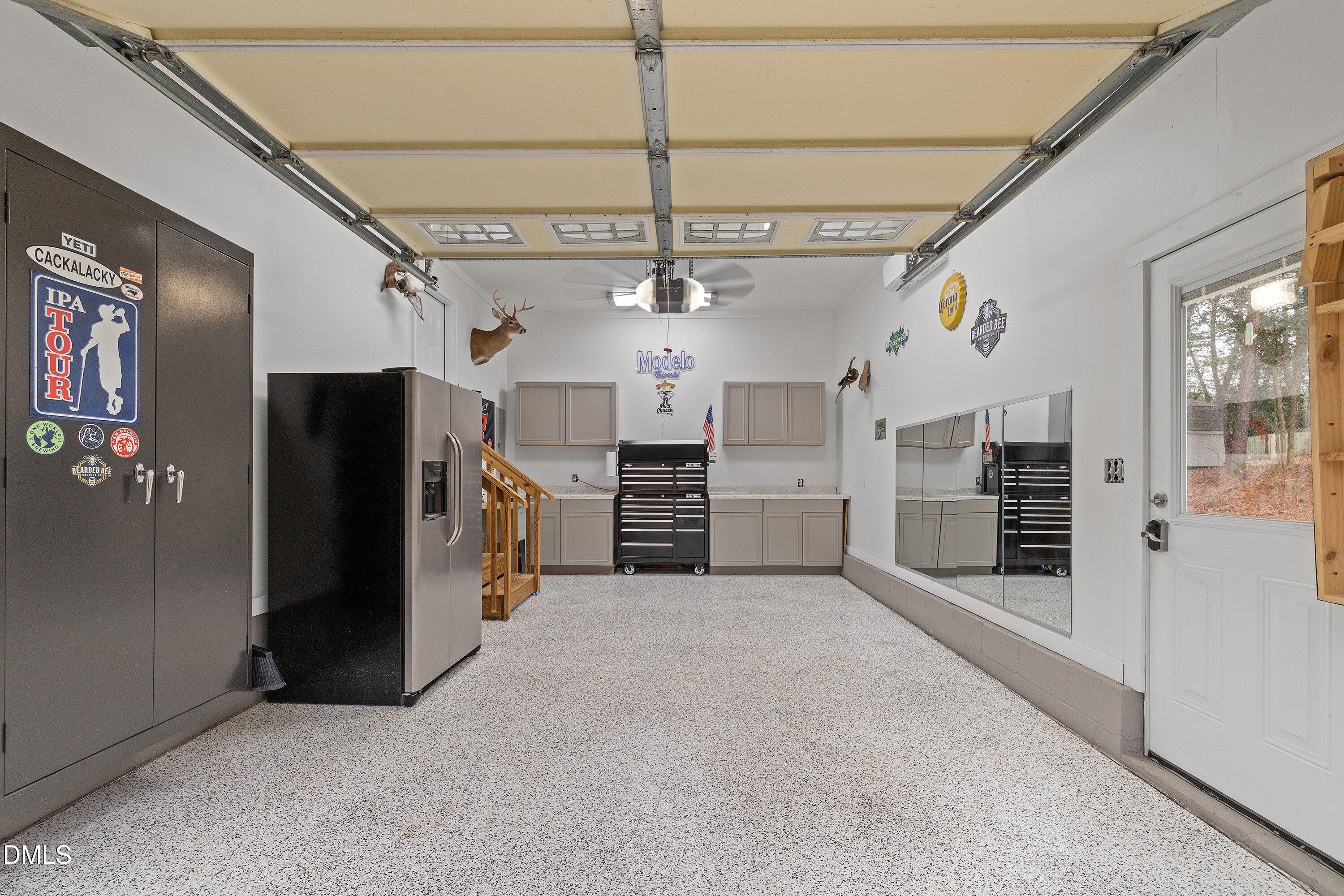 234 Linville Lane Willow Spring, NC 27592 - Photo 23 of 34 a view of a kitchen with refrigerator and a kitchen
