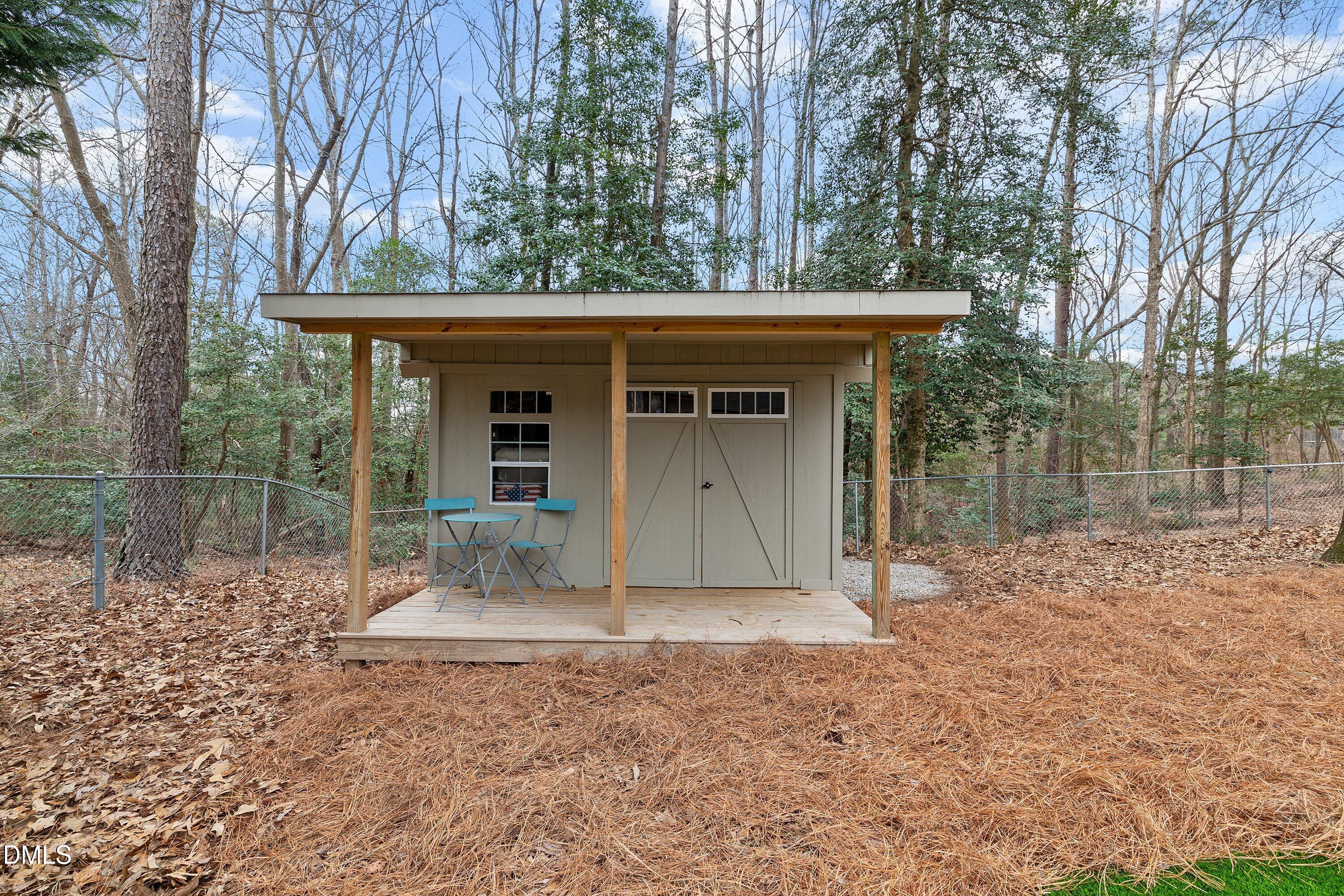 234 Linville Lane Willow Spring, NC 27592 - Photo 26 of 34 a view of a house with a yard