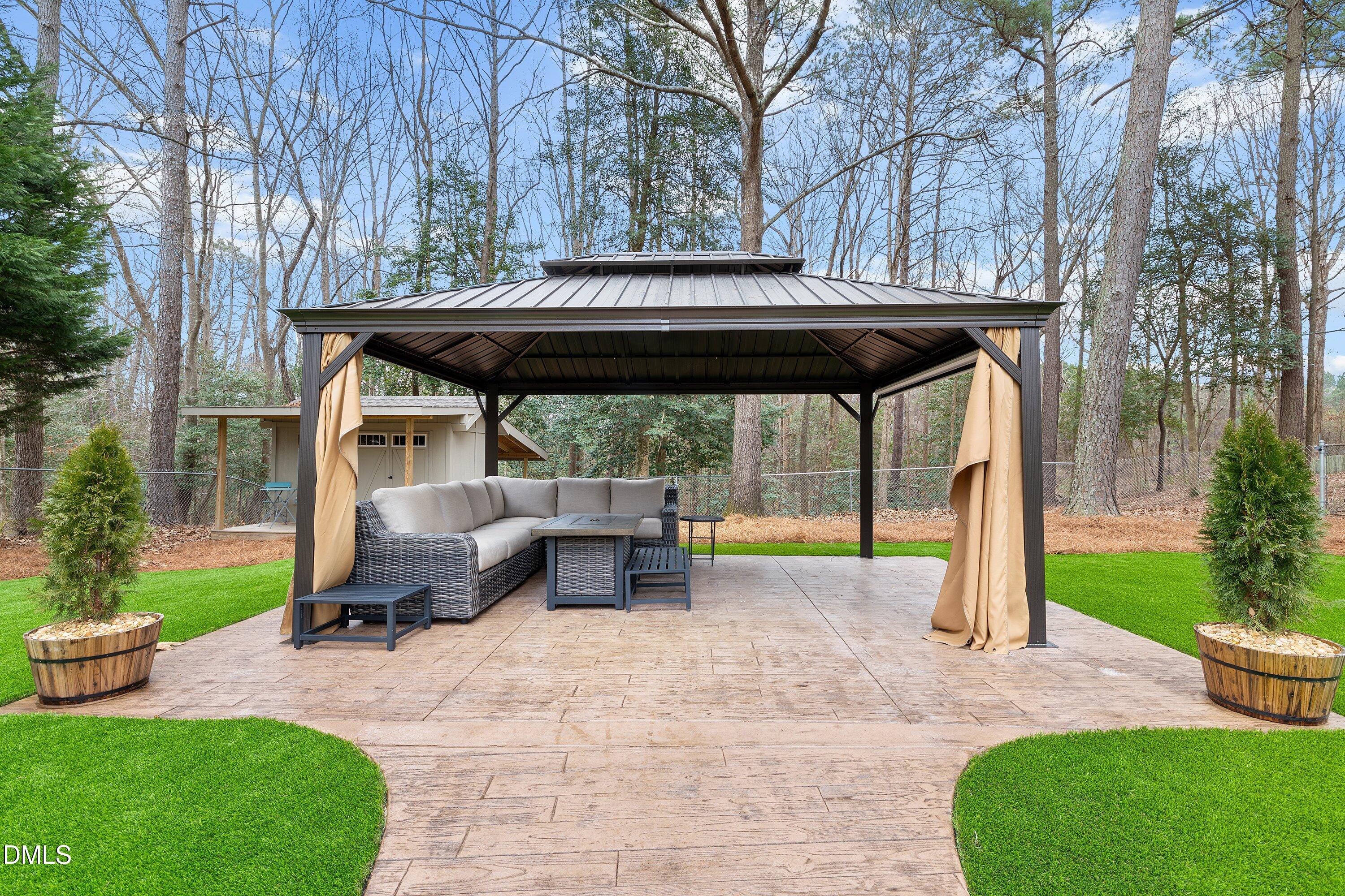234 Linville Lane Willow Spring, NC 27592 - Photo 7 of 34 a view of a swimming pool with a patio