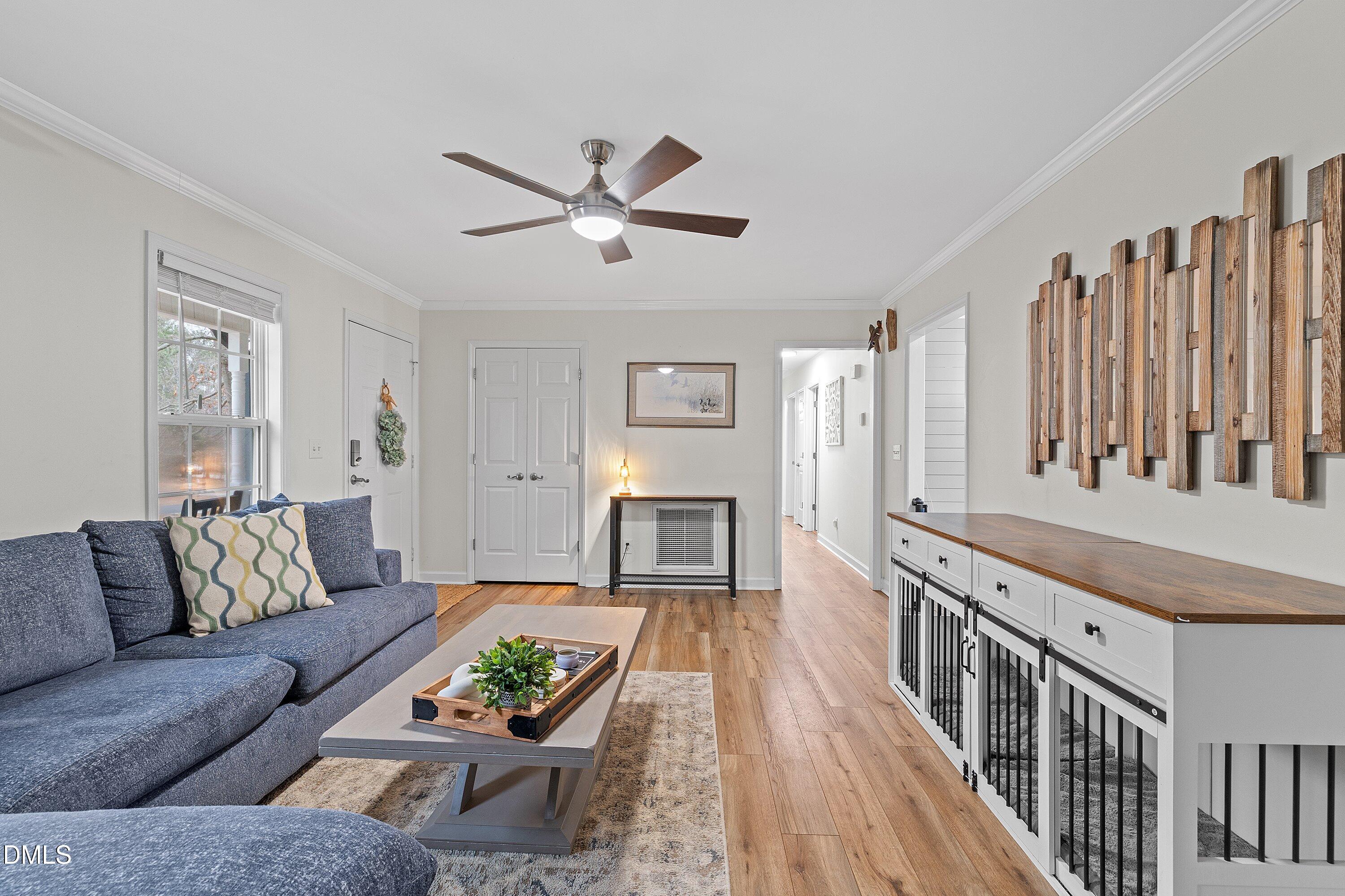 234 Linville Lane Willow Spring, NC 27592 - Photo 9 of 34 a living room with furniture and fireplace